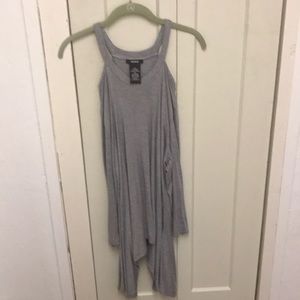 Long sleeve tunic. Handkerchief style.